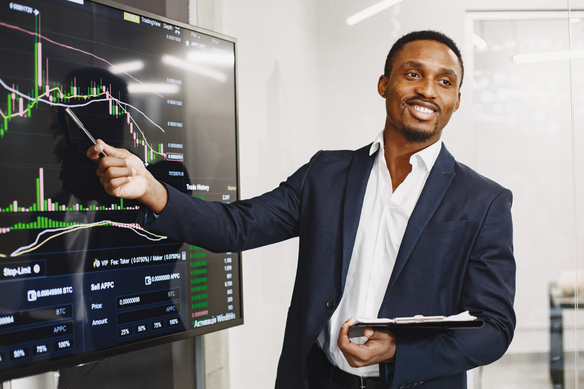 Business adviser presenting market data on a display